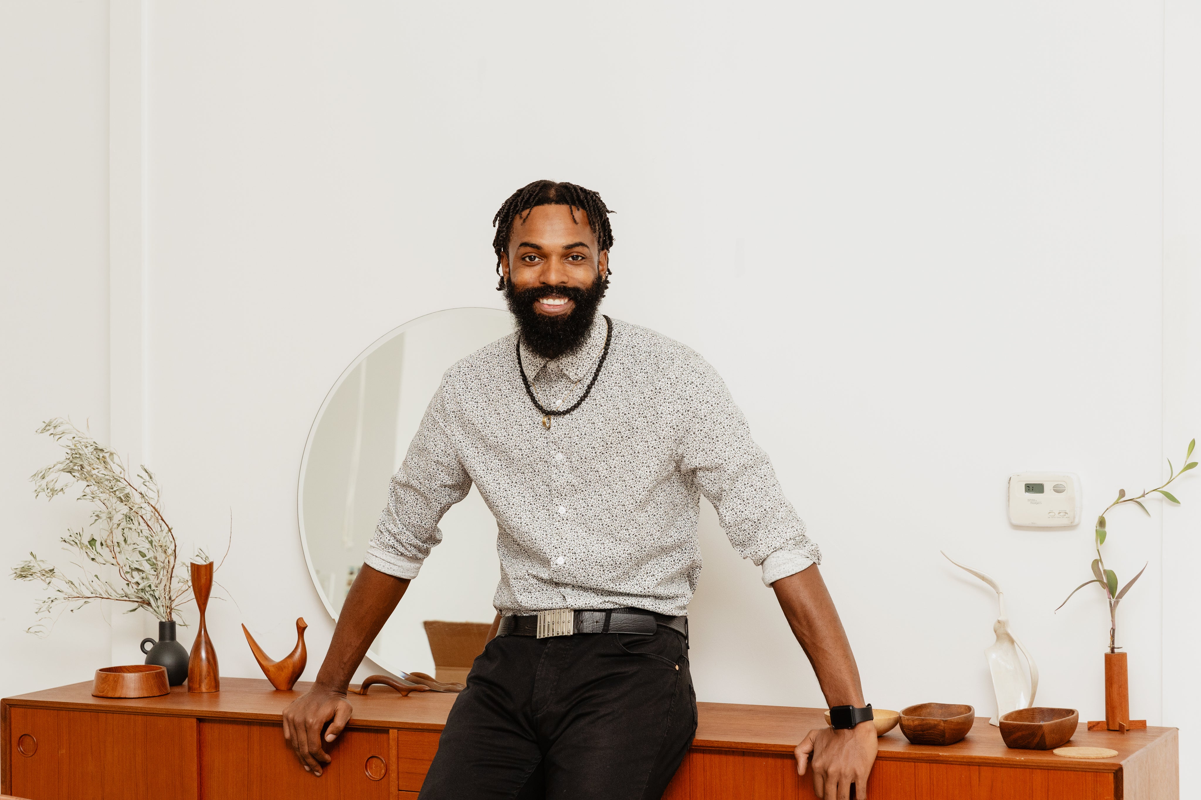 files/well-dressed-man-poses-in-living-room.jpg